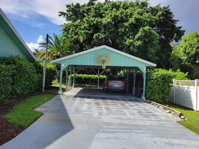 view of vehicle parking with a carport