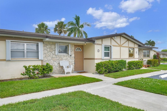 view of front of home with a front lawn