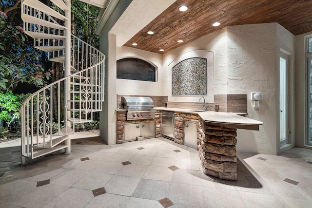 wine cellar with wood ceiling and sink