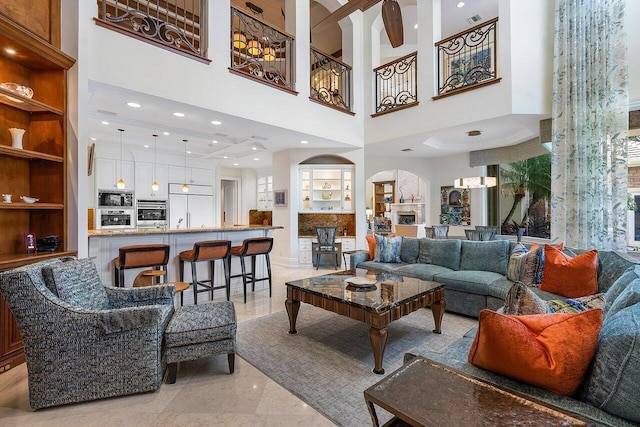 living room with a high ceiling