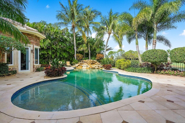 view of swimming pool featuring a patio