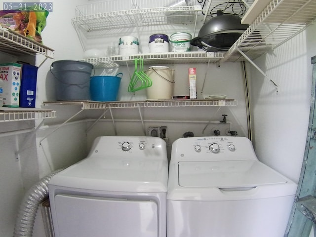 laundry area with washer and clothes dryer