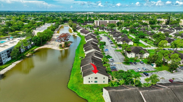 drone / aerial view featuring a water view