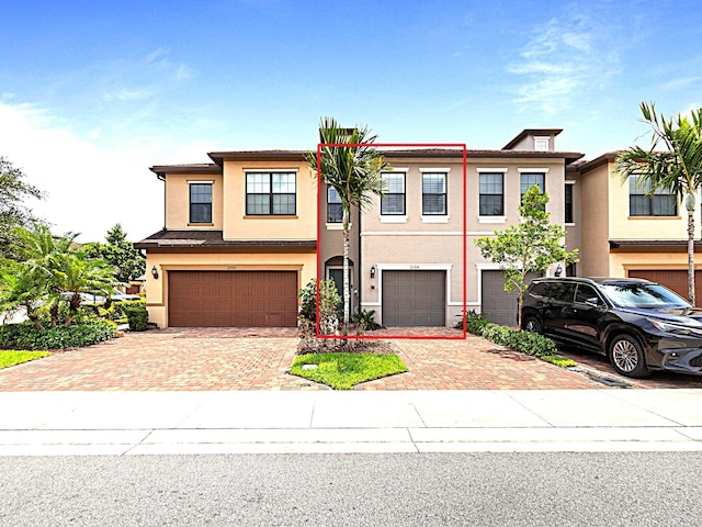 view of front of home with a garage