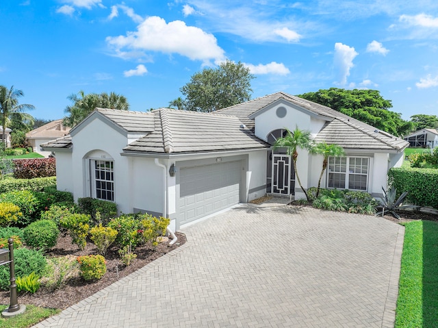 view of front of home with a garage