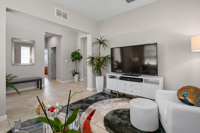 living room featuring light tile patterned flooring