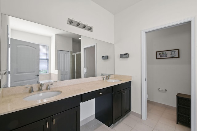 full bathroom with vanity, toilet, tile patterned floors, and separate shower and tub