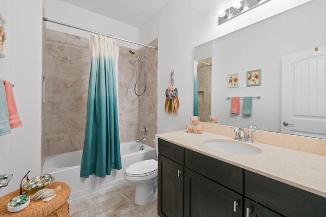 full bathroom featuring tile patterned floors, toilet, shower / bath combo with shower curtain, and vanity