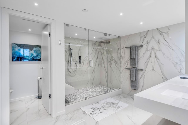 bathroom with sink and walk in shower