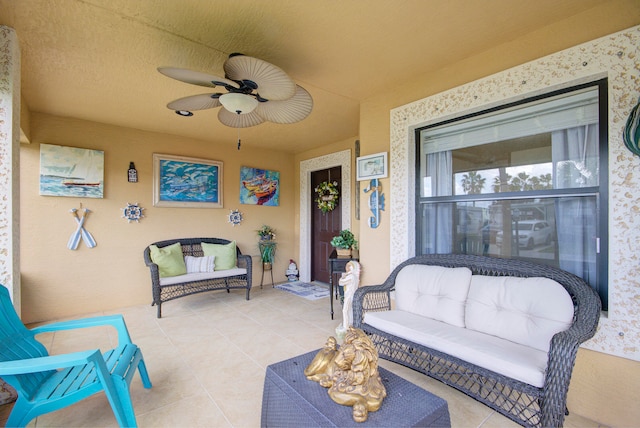 view of patio / terrace with an outdoor living space and ceiling fan