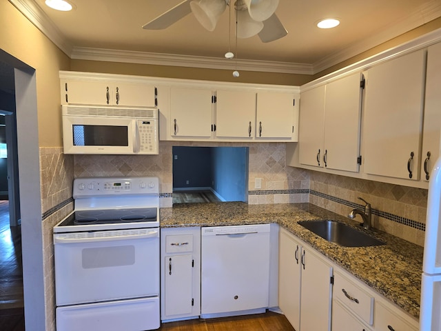 kitchen featuring ceiling fan, sink, white appliances, and white cabinetry