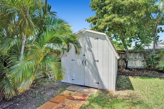 view of outdoor structure with a yard