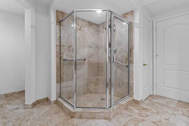 full bathroom featuring a shower stall