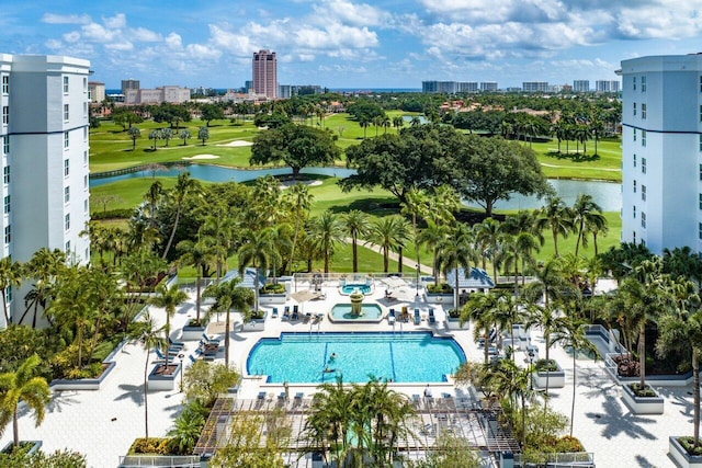 pool with a view of city and a water view