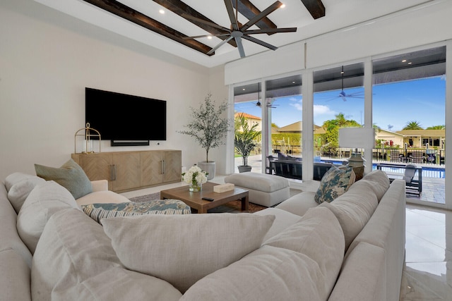 tiled living room featuring beamed ceiling