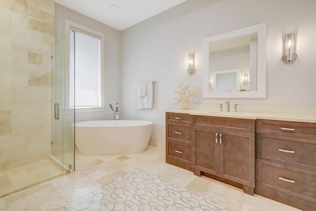 bathroom featuring shower with separate bathtub and vanity