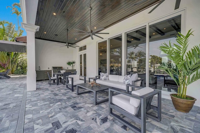 view of patio / terrace featuring an outdoor living space and french doors