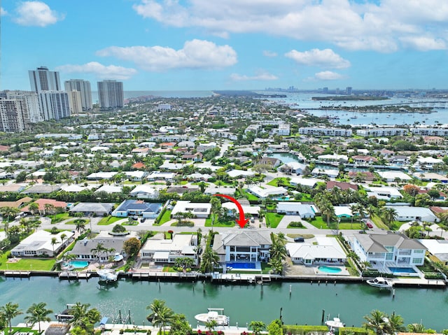 birds eye view of property featuring a water view