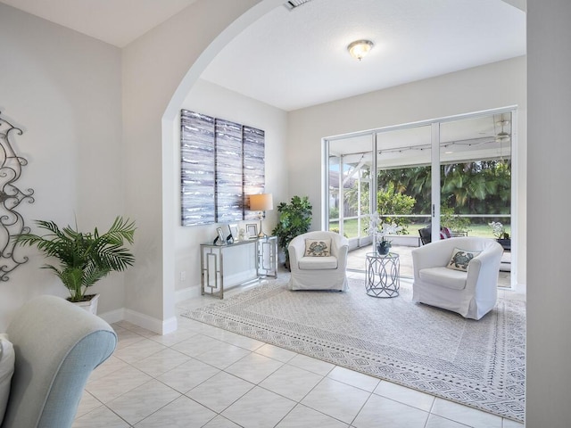 living area featuring light tile patterned flooring