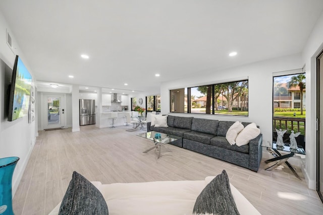 living room featuring light wood-type flooring