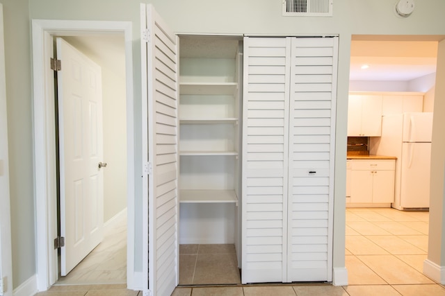 closet featuring visible vents