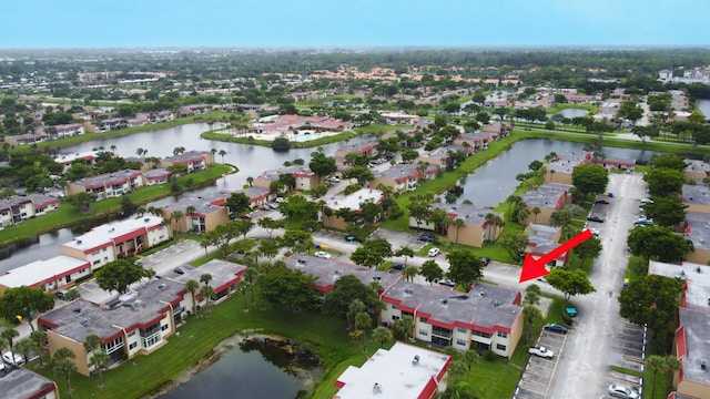 aerial view with a water view and a residential view