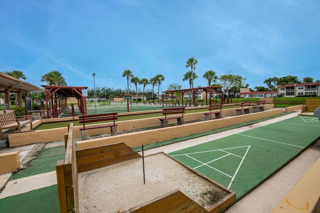 view of community with shuffleboard