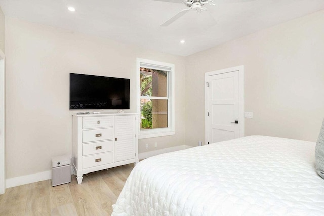 bedroom featuring ceiling fan and light wood-type flooring