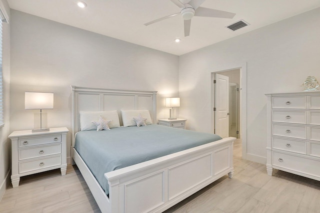 bedroom with light wood-type flooring and ceiling fan