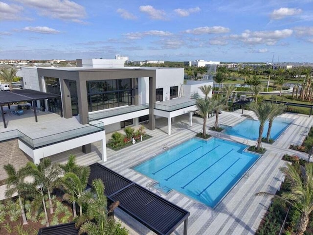 view of pool featuring a patio area