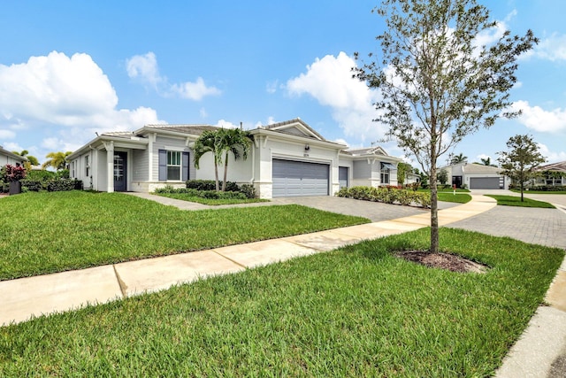 view of front facade with a front lawn and a garage