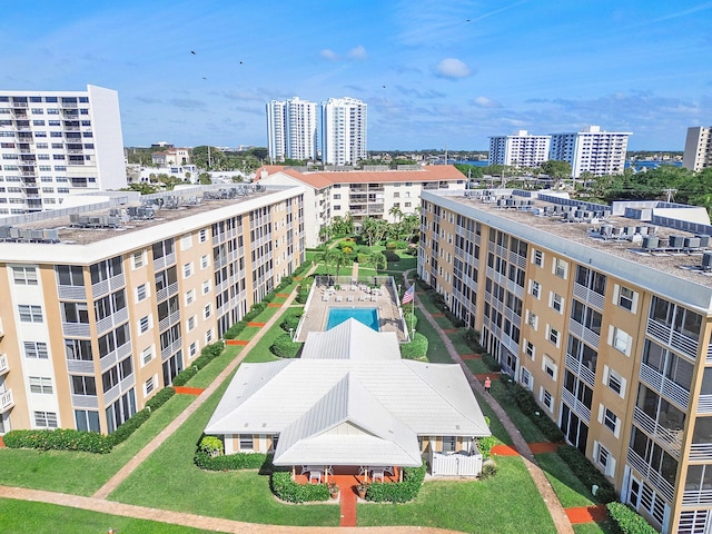 birds eye view of property featuring a city view