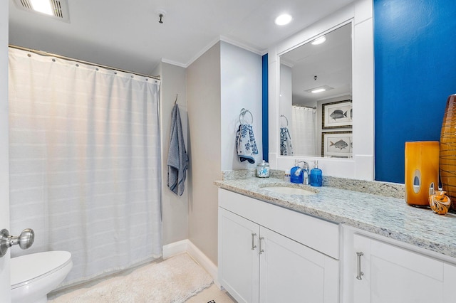 bathroom with crown molding, vanity, toilet, and a shower with curtain