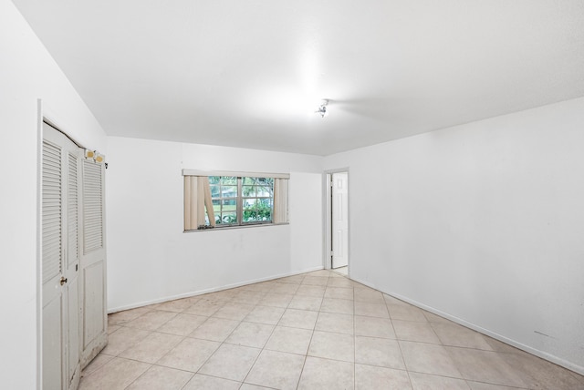 bathroom featuring vanity, toilet, and tile patterned floors