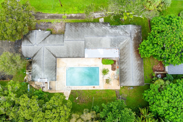 view of front of property with a garage and a front lawn