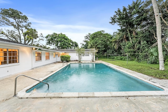 4050 Greenwood Dr, Fort Pierce, FL 34982 - view of swimming pool with a patio, a fenced in pool, and a yard