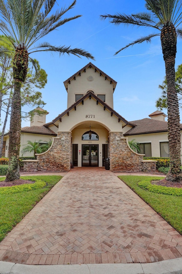 mediterranean / spanish house with french doors