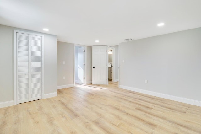 unfurnished bedroom featuring light hardwood / wood-style flooring