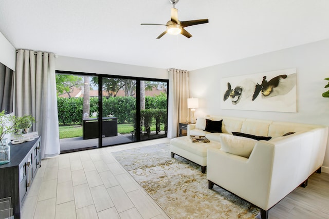 living room featuring ceiling fan