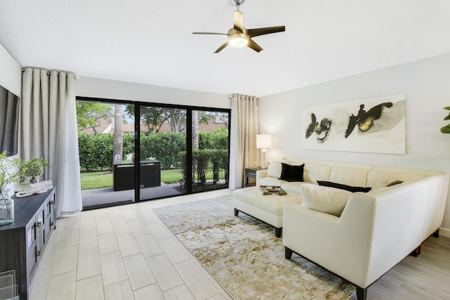 living room with ceiling fan