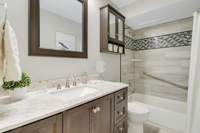 full bath featuring toilet, shower / tub combo with curtain, and vanity