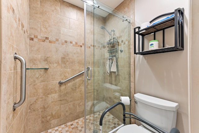 bathroom with toilet and walk in shower