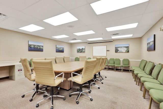 home office featuring a paneled ceiling and light colored carpet