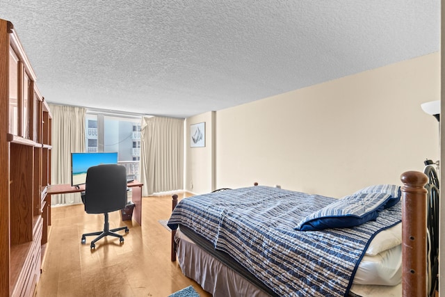 bedroom featuring a textured ceiling