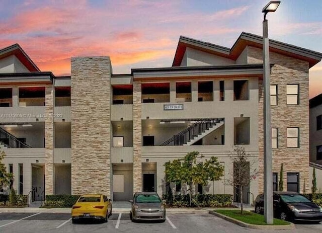 view of outdoor building at dusk