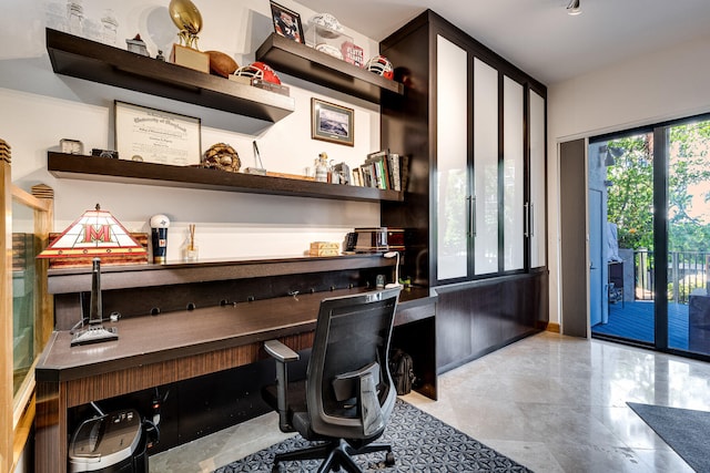 office space featuring built in desk