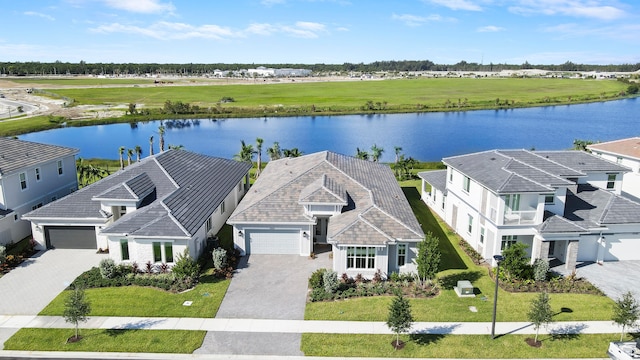 drone / aerial view featuring a water view