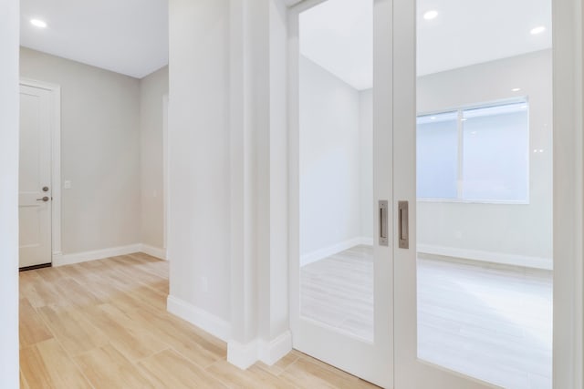 hallway featuring light wood-type flooring