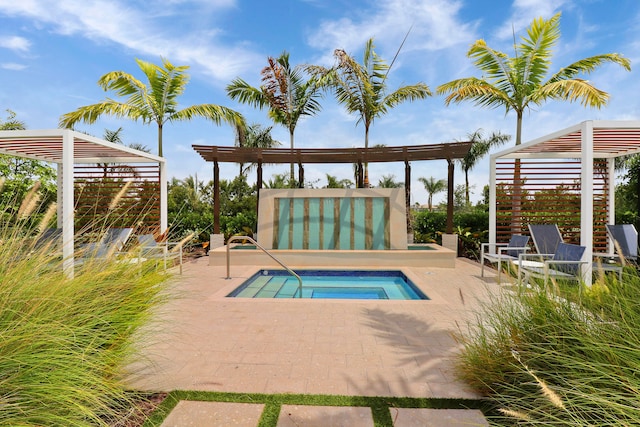 view of pool with a patio, an in ground hot tub, and a pergola