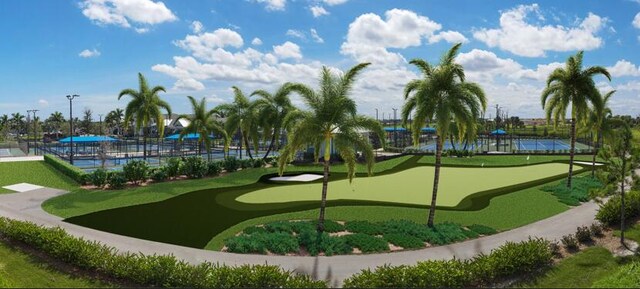 view of swimming pool featuring a patio area